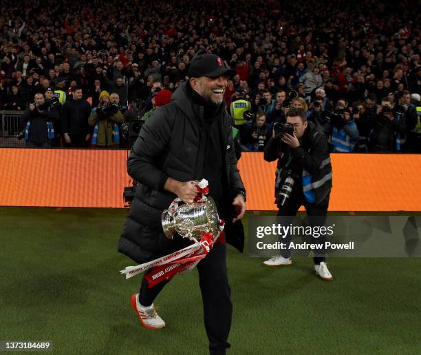 Jurgen Klopp manager of Liverpool of Liverpool with the EFL Carabao Cup trophy at the end of the Carabao Cup Final match between Chelsea and...