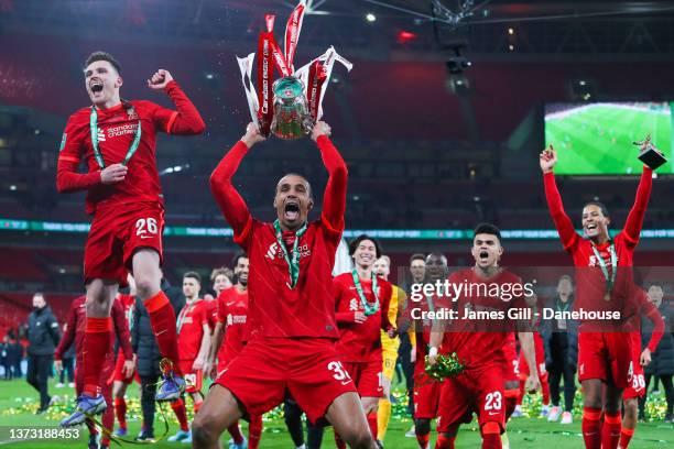 Joel Matip of Liverpool celebrates with the trophy after the Carabao Cup Final match between Chelsea and Liverpool at Wembley Stadium on February 27,...