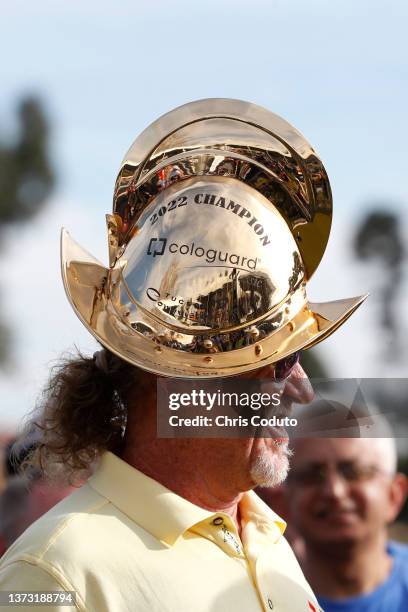 Miguel Angel Jimenez of Spain poses with the Champion's trophy following the final round of the Cologuard Classic at Omni Tucson National on February...