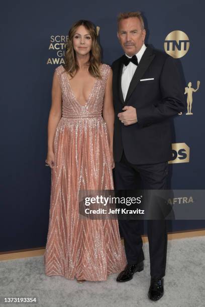 Kevin Costner and Christine Baumgartner attend the 28th Annual Screen Actors Guild Awards at Barker Hangar on February 27, 2022 in Santa Monica,...