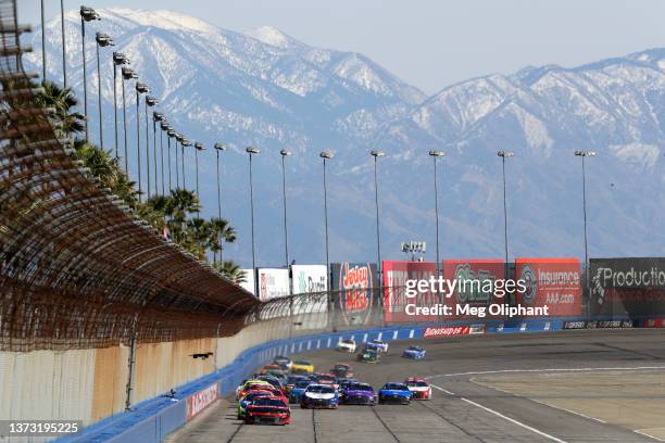 General view of racing during the NASCAR Cup Series Wise Power 400 at Auto Club Speedway on February 27, 2022 in Fontana, California.