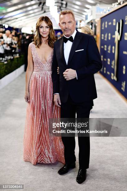 Christine Baumgartner and Kevin Costner attend the 28th Screen Actors Guild Awards at Barker Hangar on February 27, 2022 in Santa Monica, California....