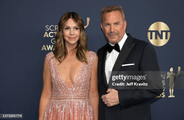 Kevin Costner and Christine Baumgartner attend the 28th Annual Screen Actors Guild Awards at Barker Hangar on February 27, 2022 in Santa Monica,...