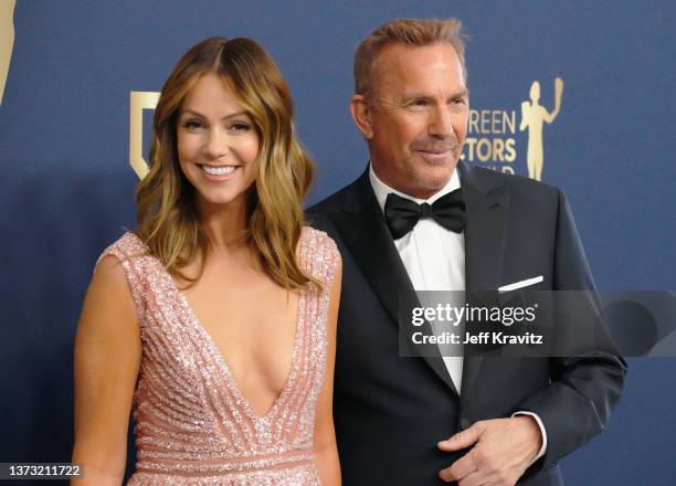 Kevin Costner and Christine Baumgartner attend the 28th Annual Screen Actors Guild Awards at Barker Hangar on February 27, 2022 in Santa Monica,...