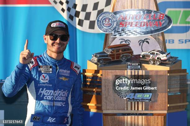 Kyle Larson, driver of the HendrickCars.com Chevrolet, celebrates in the Ruoff Mortgage victory lane after winning the NASCAR Cup Series Wise Power...