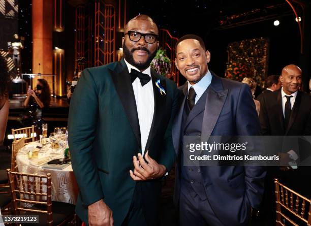 Tyler Perry and Will Smith pose during the 28th Screen Actors Guild Awards at Barker Hangar on February 27, 2022 in Santa Monica, California. 1184596