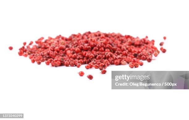 bunch red pepper,close-up of red chili pepper over white background,moldova - cranberry heart stock-fotos und bilder