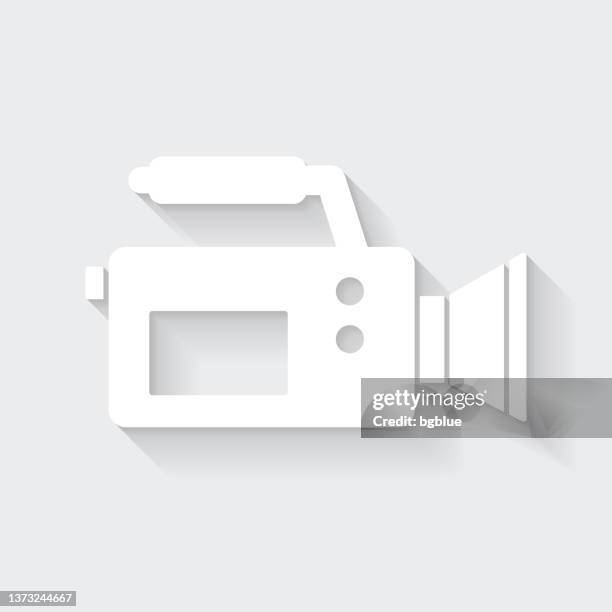 video camera. icon with long shadow on blank background - flat design - cameraman grey background stock illustrations