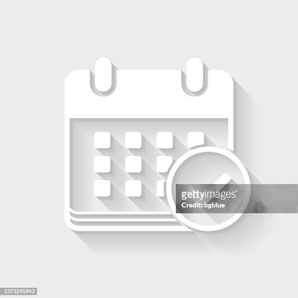 calendar with check mark. icon with long shadow on blank background - flat design - white color stock illustrations