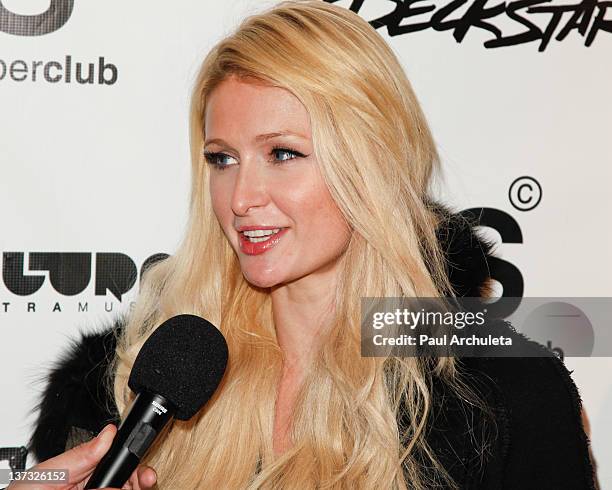 Reality TV Personality Paris Hilton attends Steve Aoki's "Wonderland" record release party and red carpet event at SupperClub Los Angeles on January...