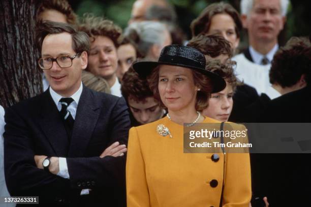 British Royal Prince Richard, Duke of Gloucester and his wife, Birgitte, Duchess of Gloucester, wearing a yellow jacket with black buttons and a...