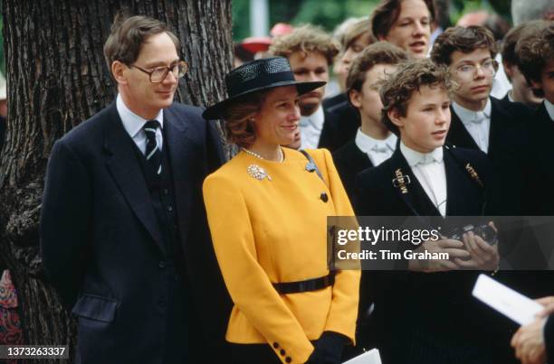 British Royal Prince Richard, Duke of Gloucester and his wife, Birgitte, Duchess of Gloucester, wearing a yellow jacket with black buttons and a...