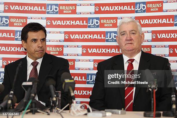 Chris Coleman sits alongside President of the Football Association of Wales Phil Pritchard as he is unveiled as the new Wales manager at a press...