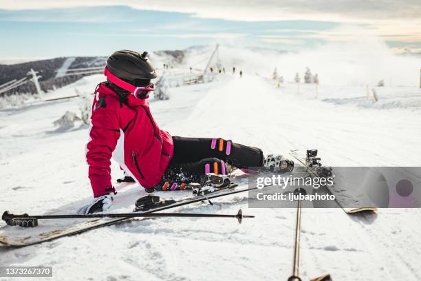 skiing injury - injured skier stock pictures, royalty-free photos & images