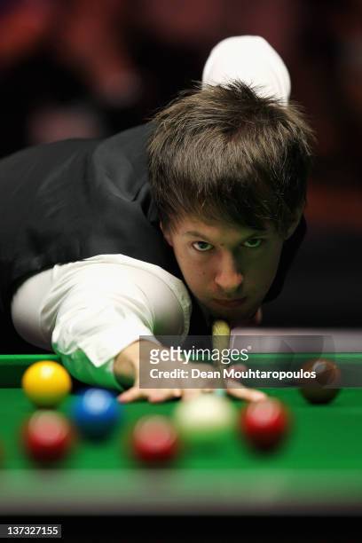 Judd Trump of England in action during his Quater Final match with Ronnie O'Sullivan of England during day five of The Masters at Alexandra Palace on...