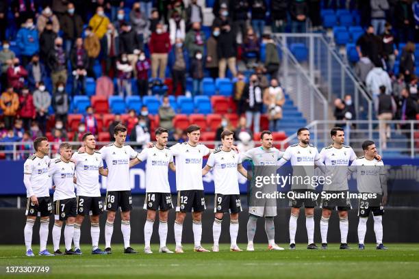 Burgos CF players huddle before the LaLiga Smartbank match between SD Eibar and Burgos CF at Estadio Municipal de Ipurua on February 27, 2022 in...