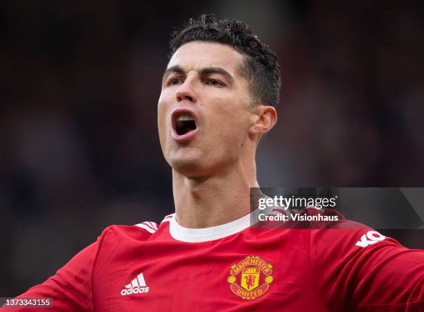 Cristiano Ronaldo of Manchester United argues with an assistant referee during the Premier League match between Manchester United and Watford at Old...