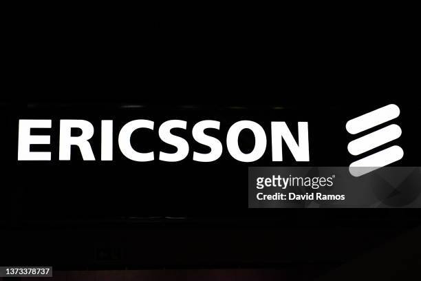 Logo sits illuminated outside the Ericsson booth at the SK telecom booth on day 1 of the GSMA Mobile World Congress on February 28, 2022 in...