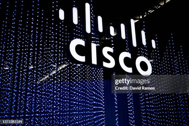 Logo sits illuminated outside the Cisco booth at the SK telecom booth on day 1 of the GSMA Mobile World Congress on February 28, 2022 in Barcelona,...