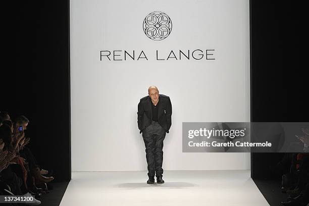 Designer Karsten Fielitz acknowledges the audience at the Rena Lange Autumn/Winter 2012 fashion show during Mercedes-Benz Fashion Week Berlin at the...