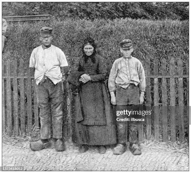 antique travel photographs of belgium: flemish family - traditionally belgian stock illustrations