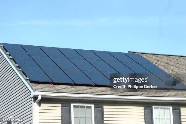 solar panel system on single home roof - pennsylvania house stock pictures, royalty-free photos & images