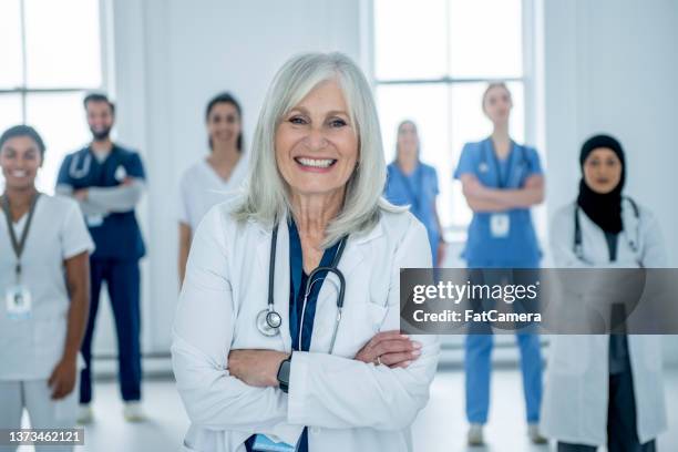 medical team portrait - pediatric medical consult hijab stock pictures, royalty-free photos & images