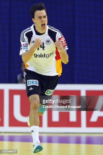 Patrick Groetzki of Germany celebrates a goal during the Men's European Handball Championship group B match between Germany and Sweden at Cair Sports...