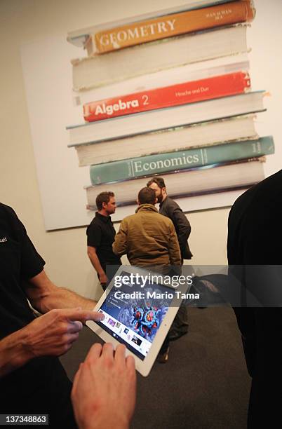 Apple's new iBooks 2 app is demonstrated for the media on an iPad at an event in the Guggenheim Museum January 19, 2012 in New York City. IBooks 2 is...