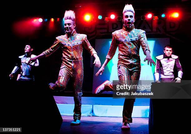 Singers John Paul Henry Daniel Richard Grimes and Edward Peter Anthony Kevin Patrick Grimes of the Irish band Jedward perform live during a concert...