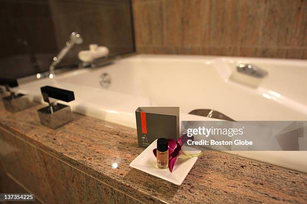 Luxurious Mandarin Oriental Signature Spa bath oil for an evening bath in the thoughtfully designed, oversized bathrooms, with soaking tubs and...