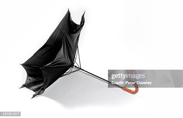 wind damaged umbrella with copy space - inside out stock pictures, royalty-free photos & images