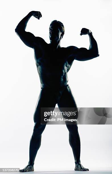 body builder on white background - bodybuilder posing stock pictures, royalty-free photos & images