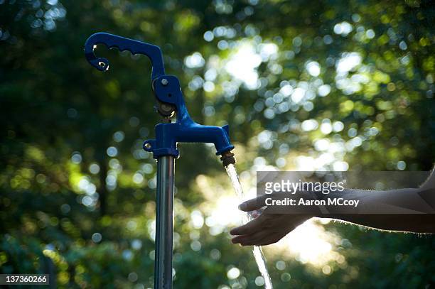 fresh water - water well stock pictures, royalty-free photos & images