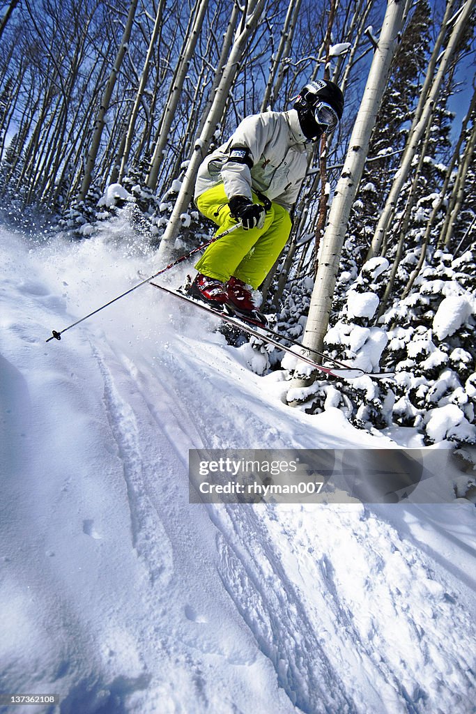 Skiing over a jump