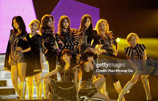 South Korean girl group Girls' Generation perform on stage during the 21st High1 Seoul Music Awards at Olympic Gymnasium on January 19, 2012 in...