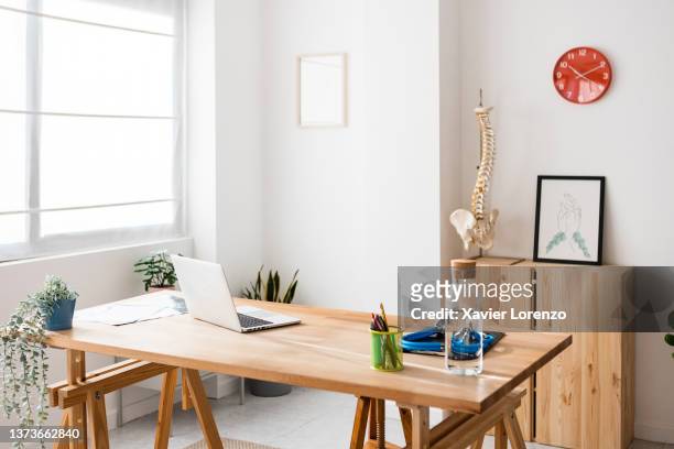 view of the interior of a modern doctor medical office - doctors office no people stock pictures, royalty-free photos & images
