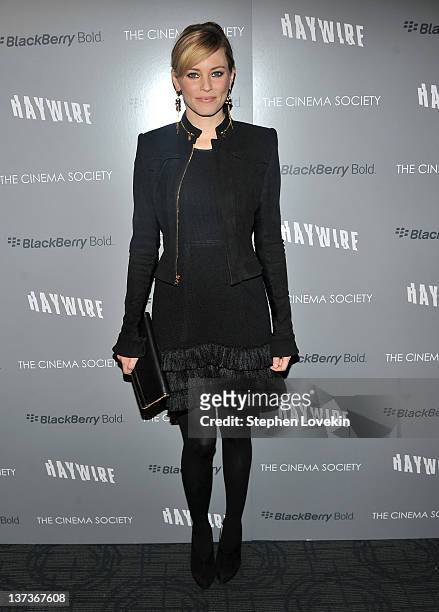 Actress Elizabeth Banks attends the Cinema Society & Blackberry Bold screening of "Haywire" at Landmark Sunshine Cinema on January 18, 2012 in New...