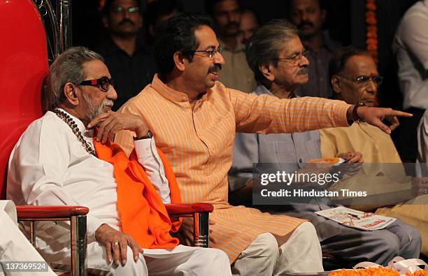 Shivsena chief Balasaheb Thackeray and executive president Uddhav Thackeray attend the party workers meeting before upcoming civic elections at...