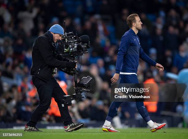 Harry Kane of Tottenham Hotspur is filmed as he takes to the field before the Premier League match between Manchester City and Tottenham Hotspur at...