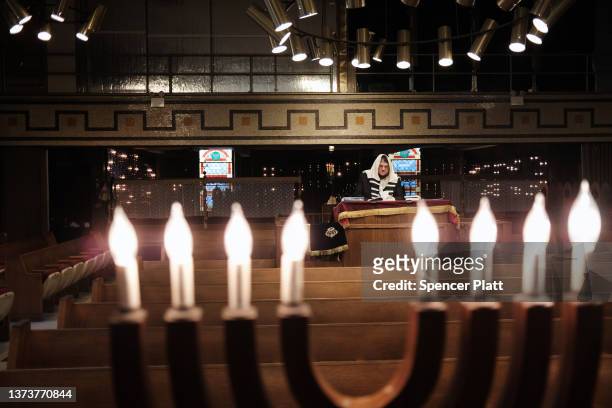 Rabbi David Okunov, whose father is Ukrainian, reads the Torah in his Brighton Beach synagogue in Brooklyn which is home to one of the largest...