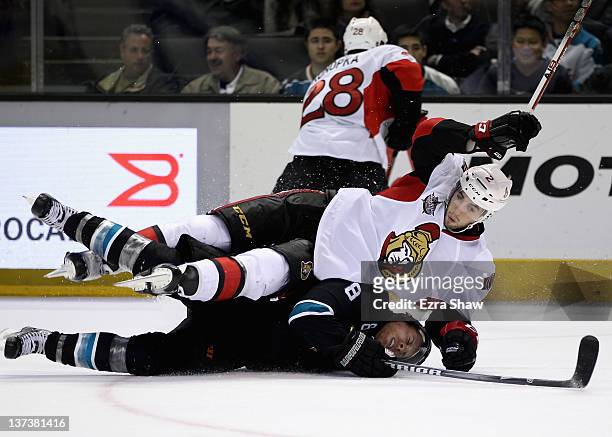 Joe Pavelski of the San Jose Sharks and Jared Cowen of the Ottawa Senators collide during their third period of their game at HP Pavilion at San Jose...