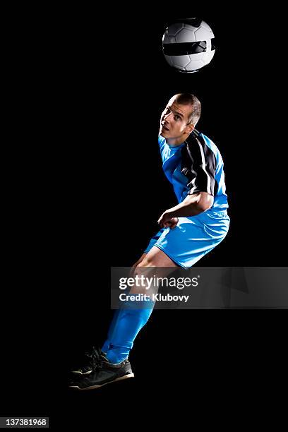 soccer player - heading the ball stock pictures, royalty-free photos & images