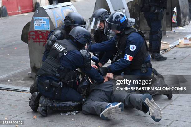 Police arrest a man during a protest in Nantes, western France on June 30 after the shooting of a teenage driver by French police in a Paris suburb...