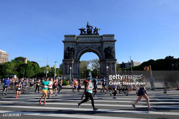 The 2019 Popular Brooklyn Half Marathon passes by Grand Army Plaza.