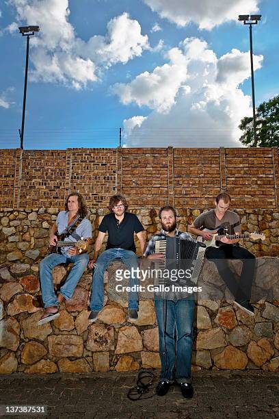 International rock group Kongos pose for photographs on January 19, 2012 in Johannesburg, South Africa. The four brothers, Johnny, Jesse, Dylan and...