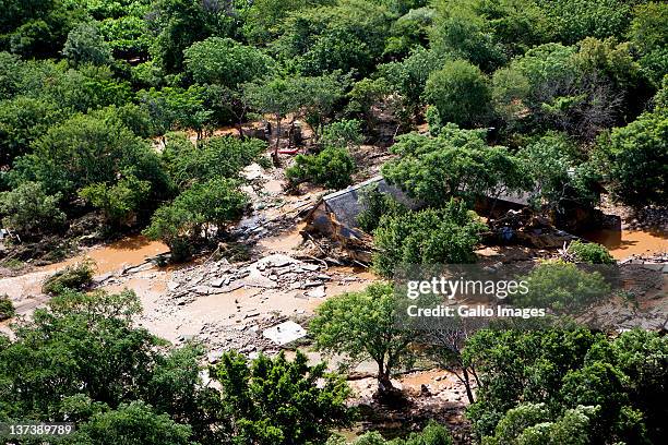 Aerial view of a flooded area on January 19, 2012 in Hoedspruit, South Africa. People were plucked from the roofs of their submerged houses and...