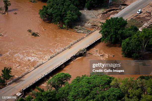 Aerial view of a flooded area on January 19, 2012 in Hoedspruit, South Africa. People were plucked from the roofs of their submerged houses and...