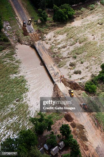 Aerial view of a flooded area on January 19, 2012 in Hoedspruit, South Africa. People were plucked from the roofs of their submerged houses and...