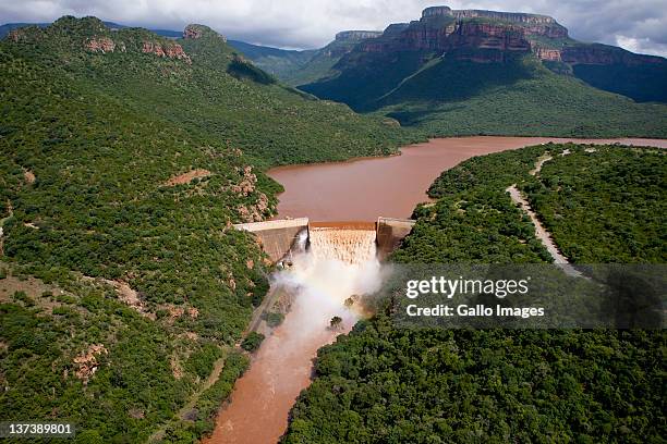 Aerial view of a flooded area on January 19, 2012 in Hoedspruit, South Africa. People were plucked from the roofs of their submerged houses and...